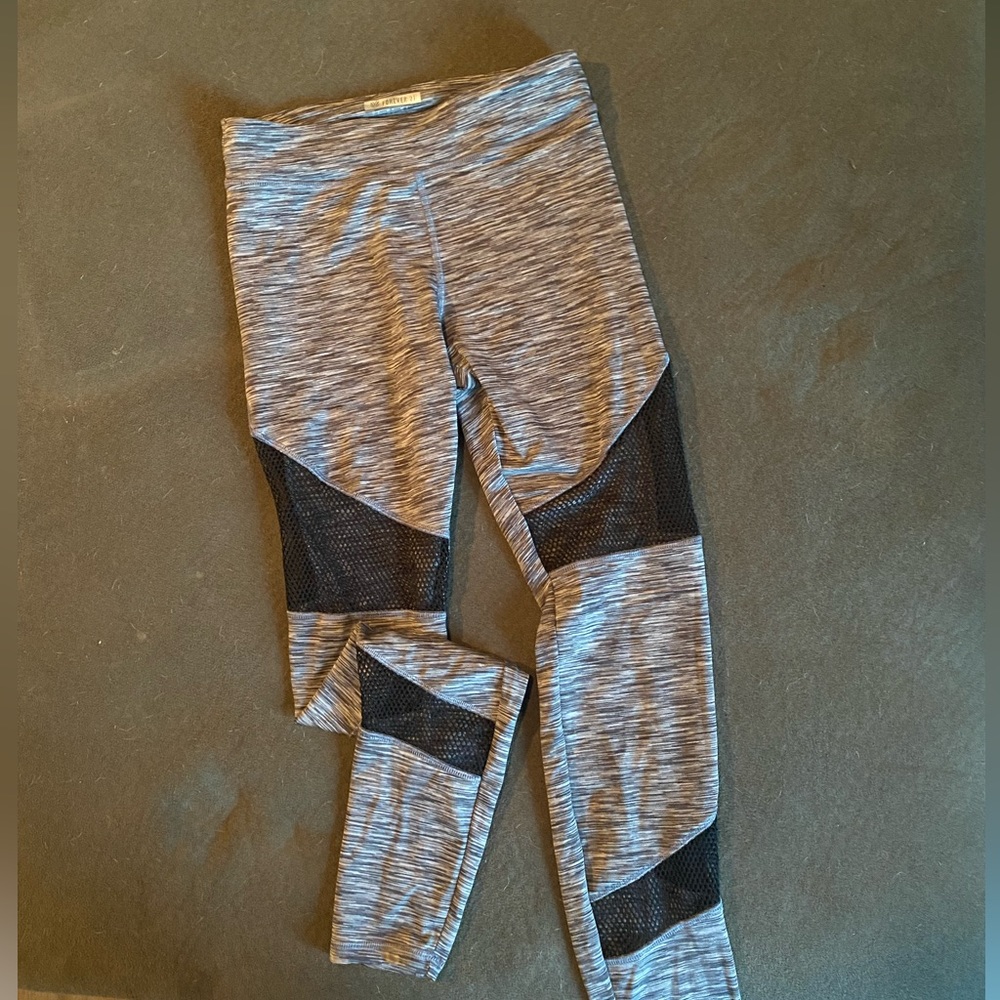 Forever 21 leggings.‎ Women’s size small. Gray with black mesh.